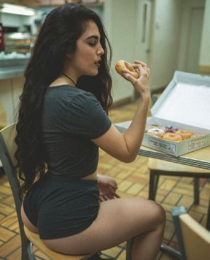 Camila Radoslovich Enjoying Her Morning Donuts